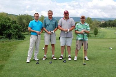 DairyCheq US. Pictured left to right: Robert Hoyt, Dave Luzader, J.J. Kinsey, Chuck Hazelwood.