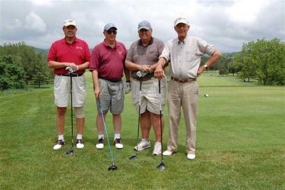 Hartman. Pictured left to right: Jim Lyons, Mike Sporakowski, Ed Zamer, Dennis Hartman.
