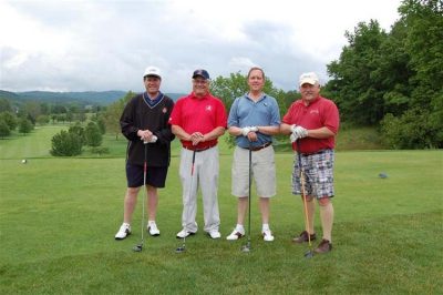 Maryland & Virginia Milk Producers - Orange. Pictured left to right: Fred Calvert, Sandy Rhodes, Jan Tenpas, Jerry Swisher.