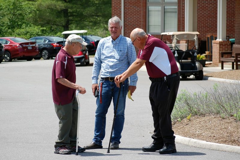 Dr. Carl Polan (retired Dairy Science professor), Chuck Miller (retired Dairy Farm supervisor) and Dr. David Gerrard conferring on tournament day.