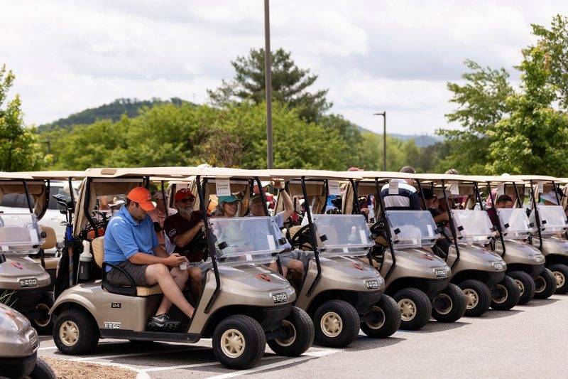 Hokie Cow Classic 2022. Golf carts and players lining up.