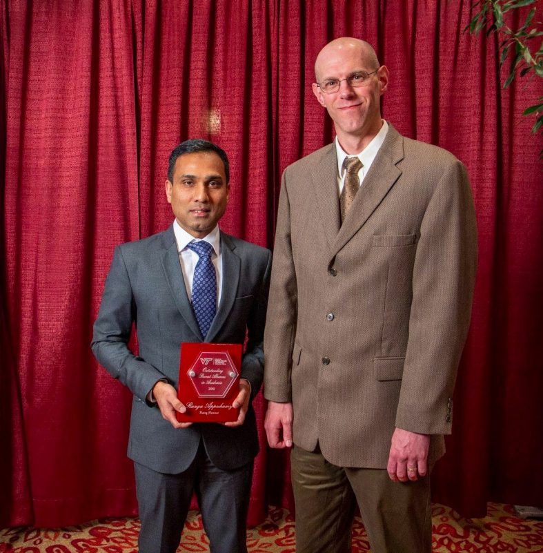 Recipient of the Dairy Science's Outstanding Recent Alumnus in Academia Award, Dr. Ranga Appuhamy, pictured with Dr. Ben Corl, Interim Department Head.